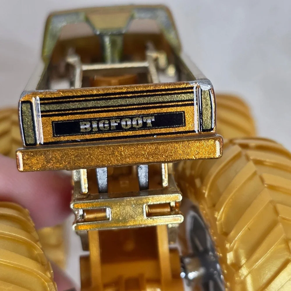 Hot Wheels Monster Trucks Bigfoot 4x4 50th Anniversary Gold 1:64 Scale Die-Cast